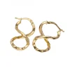 Pendientes de oro amarillo 18K con diseño de espiral