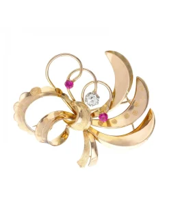 Prendedor de oro amarillo 18K con diseño boquete brillantes y rubíes