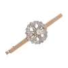 Prendedor tipo Aguja, de Oro rosado y blanco, con diseño de flor y Brillantes
