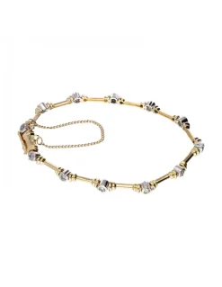 Pulsera de oro amarillo 18 K con diseño y brillantes