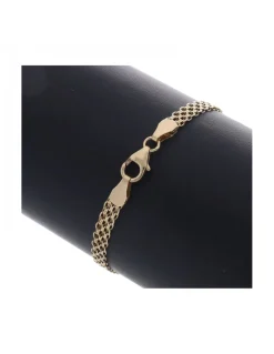 Pulsera de Oro amarillo con diseño de Infinito y Circonitas