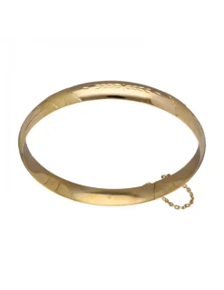 Pulsera de Oro amarillo con diseño rígido y detalles labrados