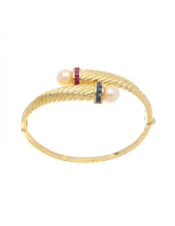 Pulsera de oro amarillo 18K con diseño zafiros rubíes y perlas