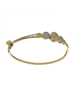 Pulsera de oro amarillo 18K con diseño rígido y circonitas