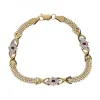 Pulsera de Oro amarillo 18K con diseño y Circonitas