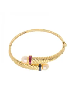 Pulsera de oro amarillo 18K con diseño zafiros rubíes y perlas