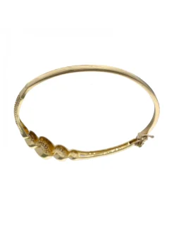 Pulsera de oro amarillo 18K con diseño rígido y circonitas