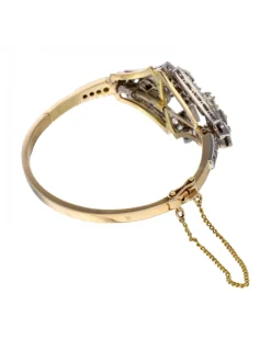 Pulsera de oro amarillo y blanco 18K con diseño y brillantes