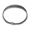 Pulsera de Oro blanco con diseño semirrígido y nueve Brillantes