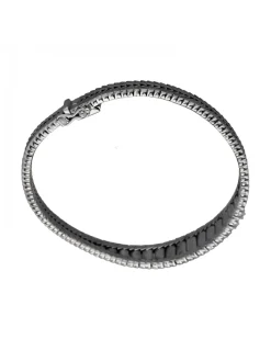 Pulsera de Oro blanco con diseño semirrígido y nueve Brillantes