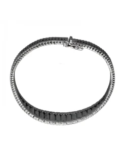 Pulsera de Oro blanco con diseño semirrígido y nueve Brillantes
