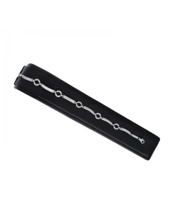 Pulsera de oro blanco 18K con diseño semi rígido y circonitas