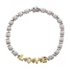 Pulsera de Oro blanco y amarillo, con eslabones cuadrados, palabra LOVE y Brillantes