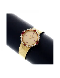 Reloj de Oro amarillo con diseño OMEGA, Brillantes y Rubíes