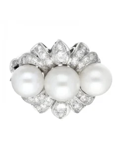 Rosetón con brillantes y tres perlas oro blanco 18kl