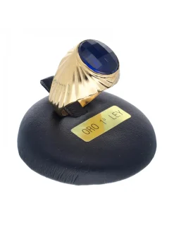 Sello de oro amarillo 18K con diseño y piedra sintética azul