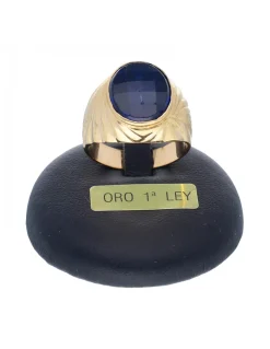Sello de oro amarillo 18K con diseño y piedra sintética azul