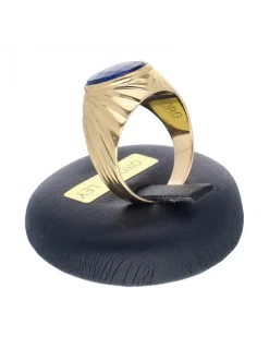 Sello de oro amarillo 18K con diseño y piedra sintética azul