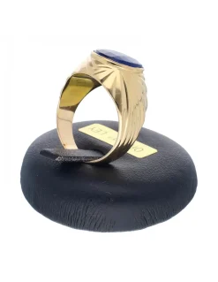 Sello de oro amarillo 18K con diseño y piedra sintética azul