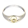 Solitario con brillante oro blanco y amarillo 18kl
